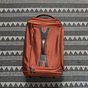 tumi orange carry on